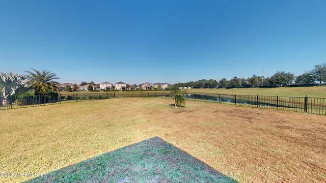 a view of a swimming pool and an outdoor space