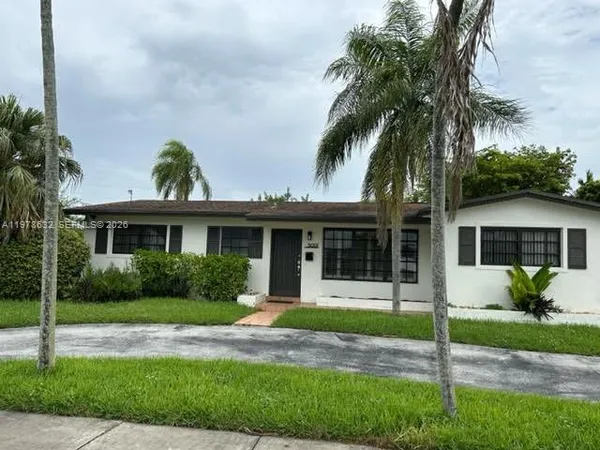 front view of a house with a yard