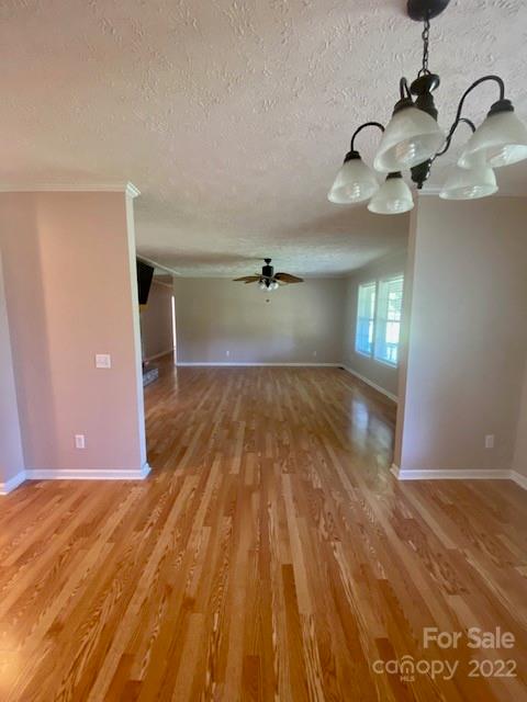 2247 State Rd S-46-149 Clover, SC 29710 - Photo 12 of 35 a view of a room with wooden floor and windows
