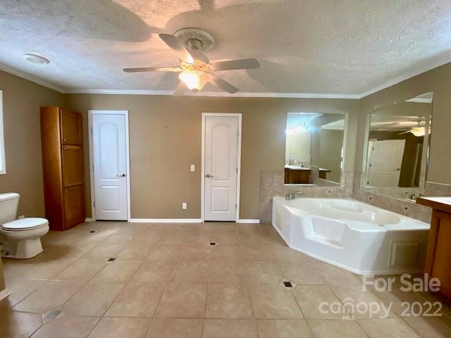 2247 State Rd S-46-149 Clover, SC 29710 - Photo 14 of 35 a bathroom with a sink a toilet and mirror