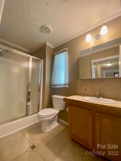 2247 State Rd S-46-149 Clover, SC 29710 - Photo 19 of 35 a bathroom with a sink toilet and a mirror