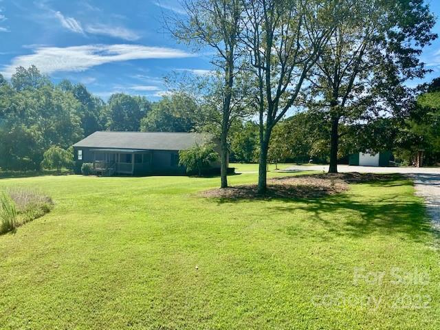 2247 State Rd S-46-149 Clover, SC 29710 - Photo 22 of 35 a view of a house with a yard