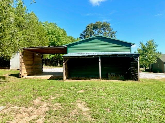 2247 State Rd S-46-149 Clover, SC 29710 - Photo 25 of 35 a view of a house with garden and garage