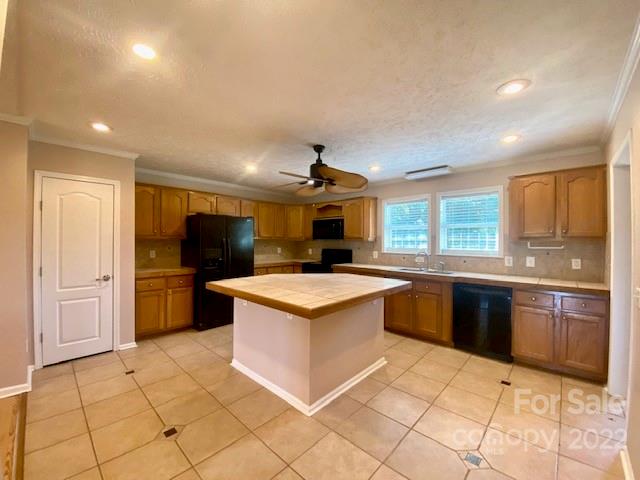 2247 State Rd S-46-149 Clover, SC 29710 - Photo 3 of 35 a kitchen with a stove top oven sink and cabinets