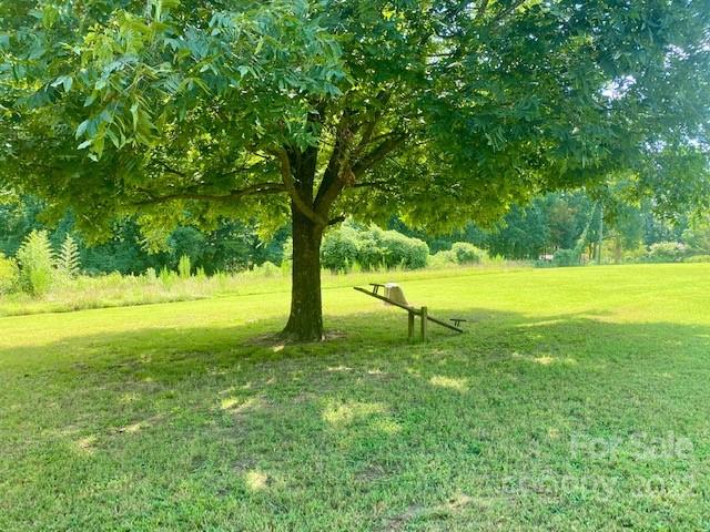 2247 State Rd S-46-149 Clover, SC 29710 - Photo 33 of 35 a view of a yard with a tree