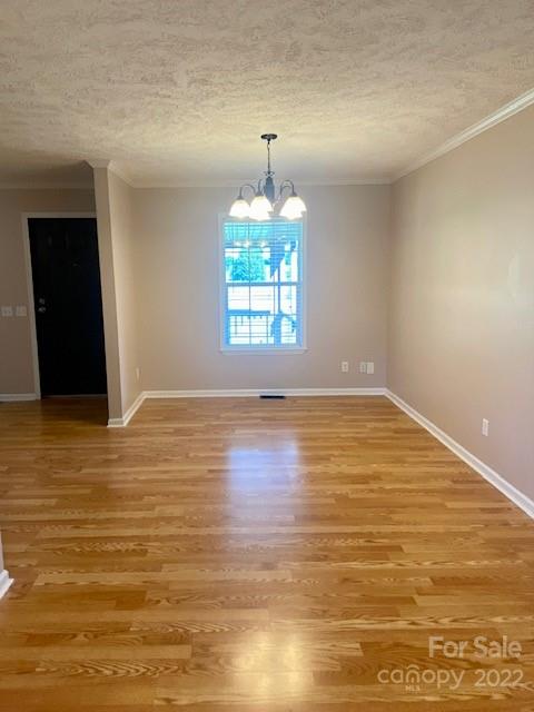 2247 State Rd S-46-149 Clover, SC 29710 - Photo 10 of 35 wooden floor in an empty room with a window