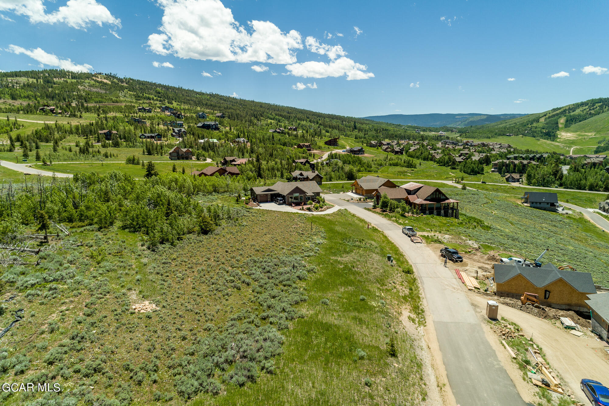 502 Upper Ranch View Drive Granby, CO 80446 - Photo 13 of 40 a view of a swimming pool and a yard