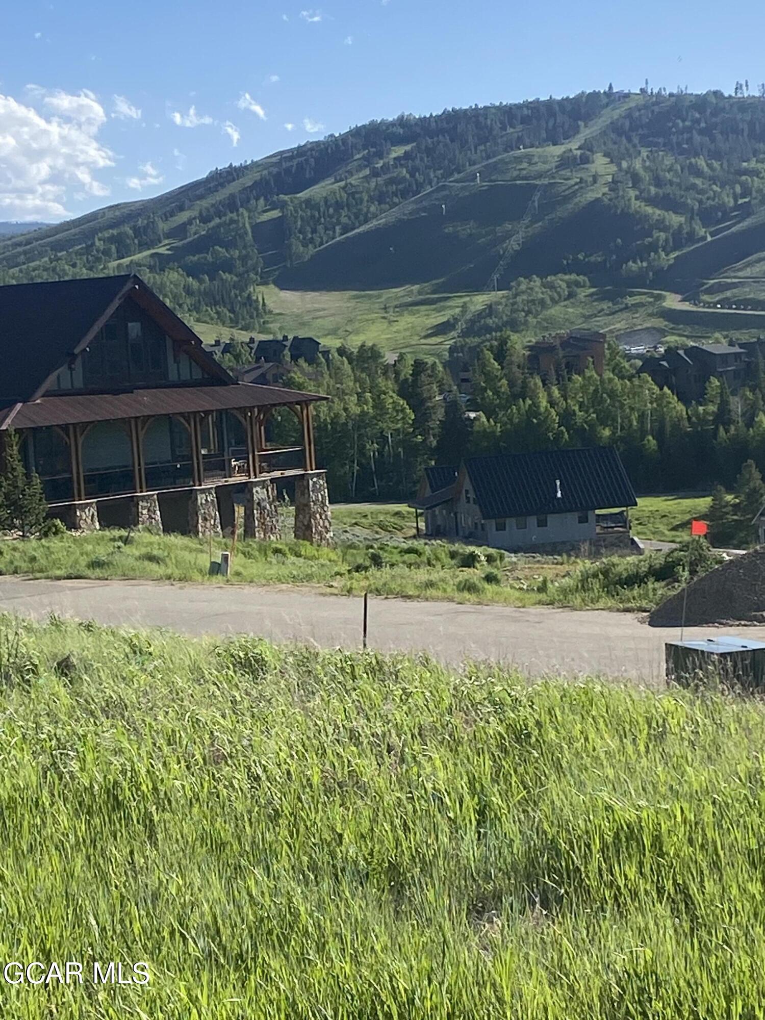 502 Upper Ranch View Drive Granby, CO 80446 - Photo 2 of 40 a front view of a house with a yard