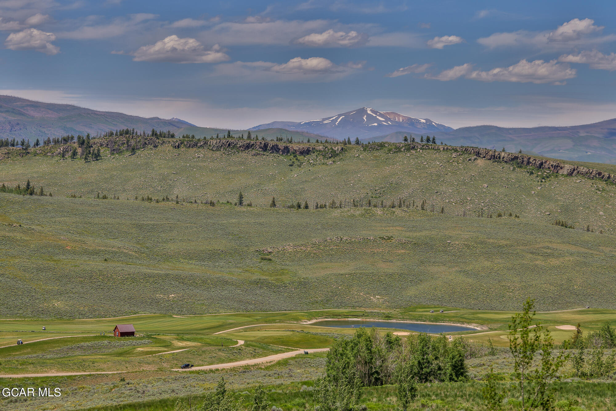 502 Upper Ranch View Drive Granby, CO 80446 - Photo 25 of 40 a view of an ocean and a mountain