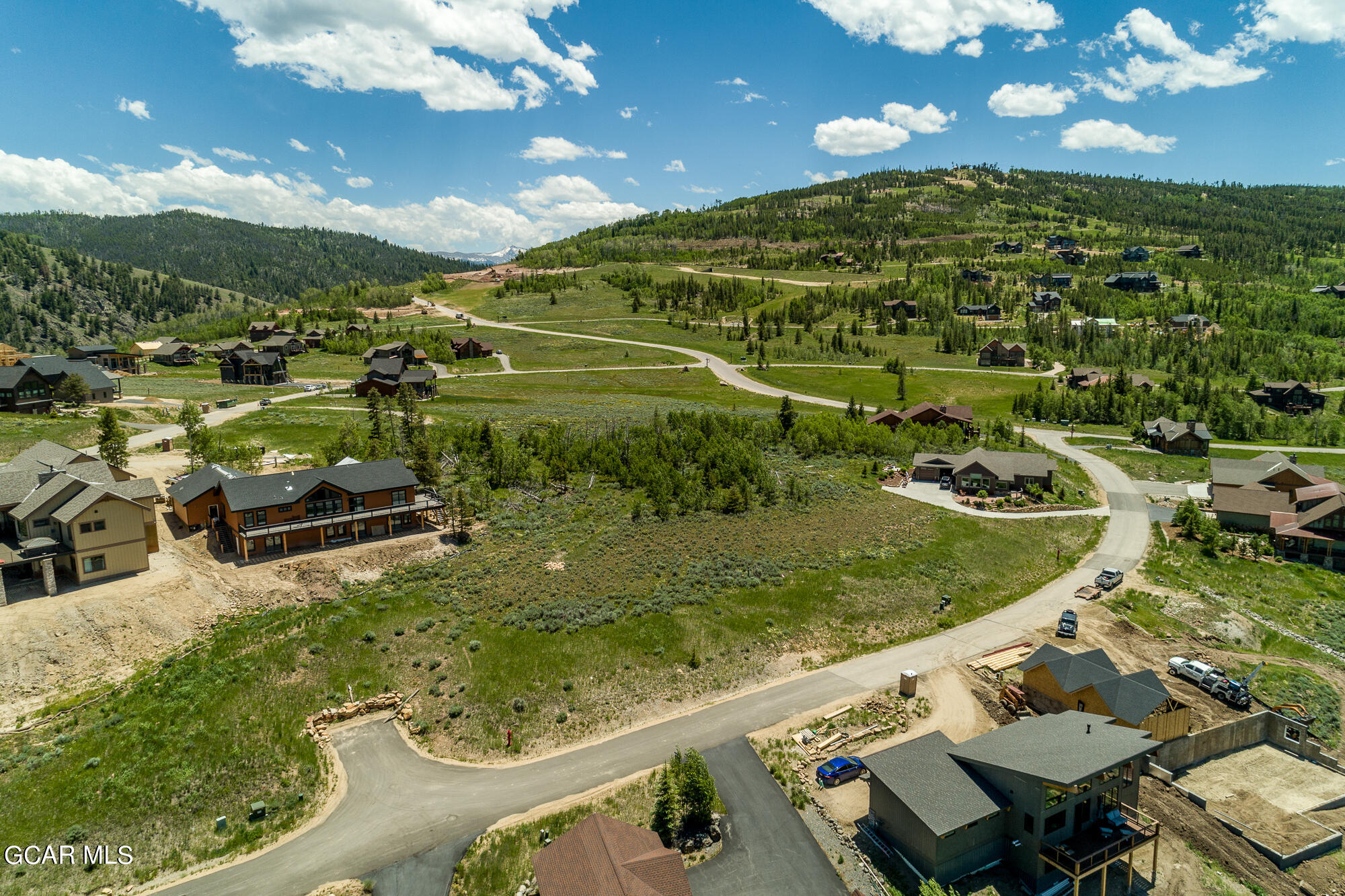 502 Upper Ranch View Drive Granby, CO 80446 - Photo 29 of 40 a view of a swimming pool with a yard
