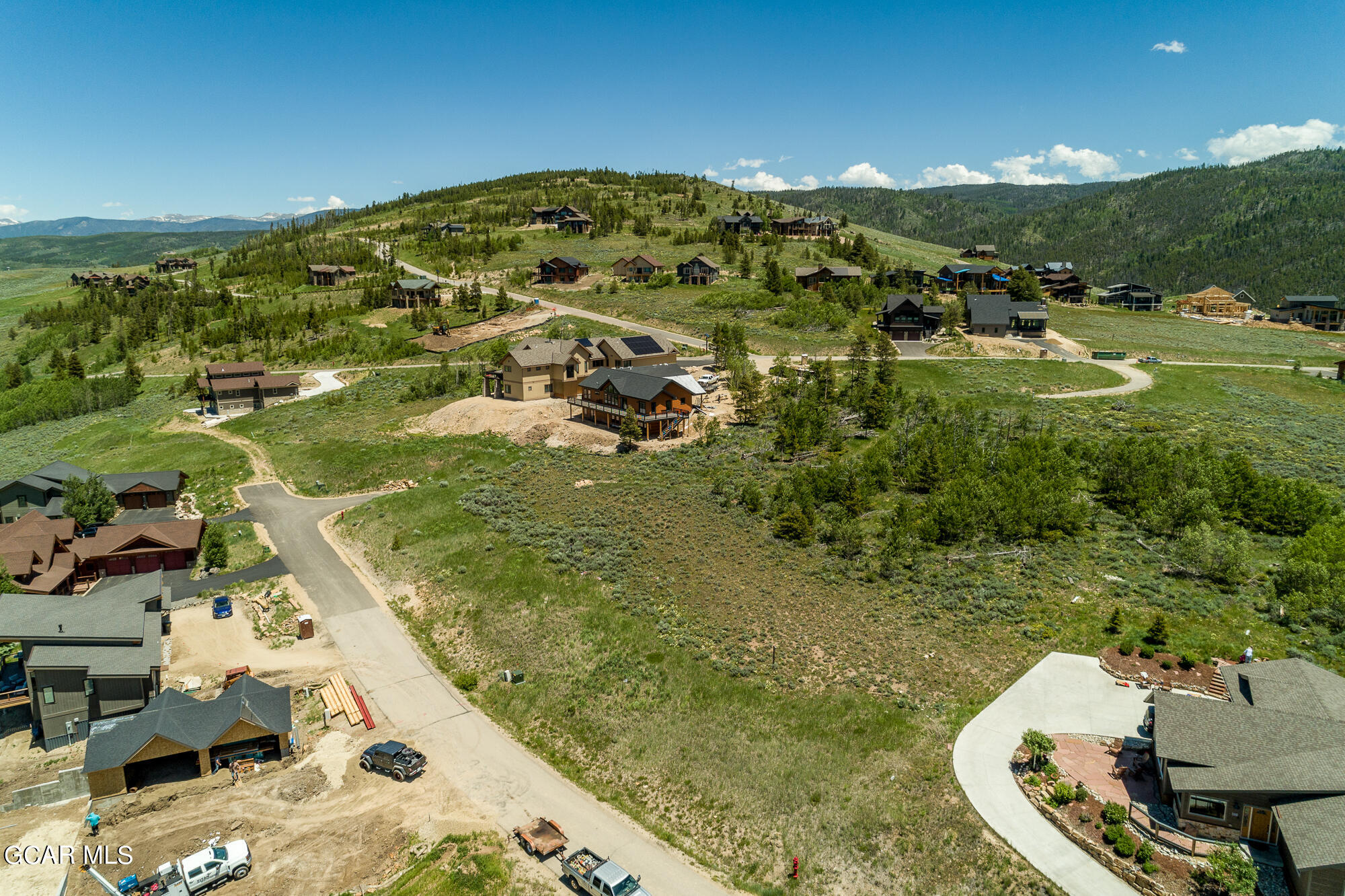 502 Upper Ranch View Drive Granby, CO 80446 - Photo 32 of 40 a view of a lake with a yard