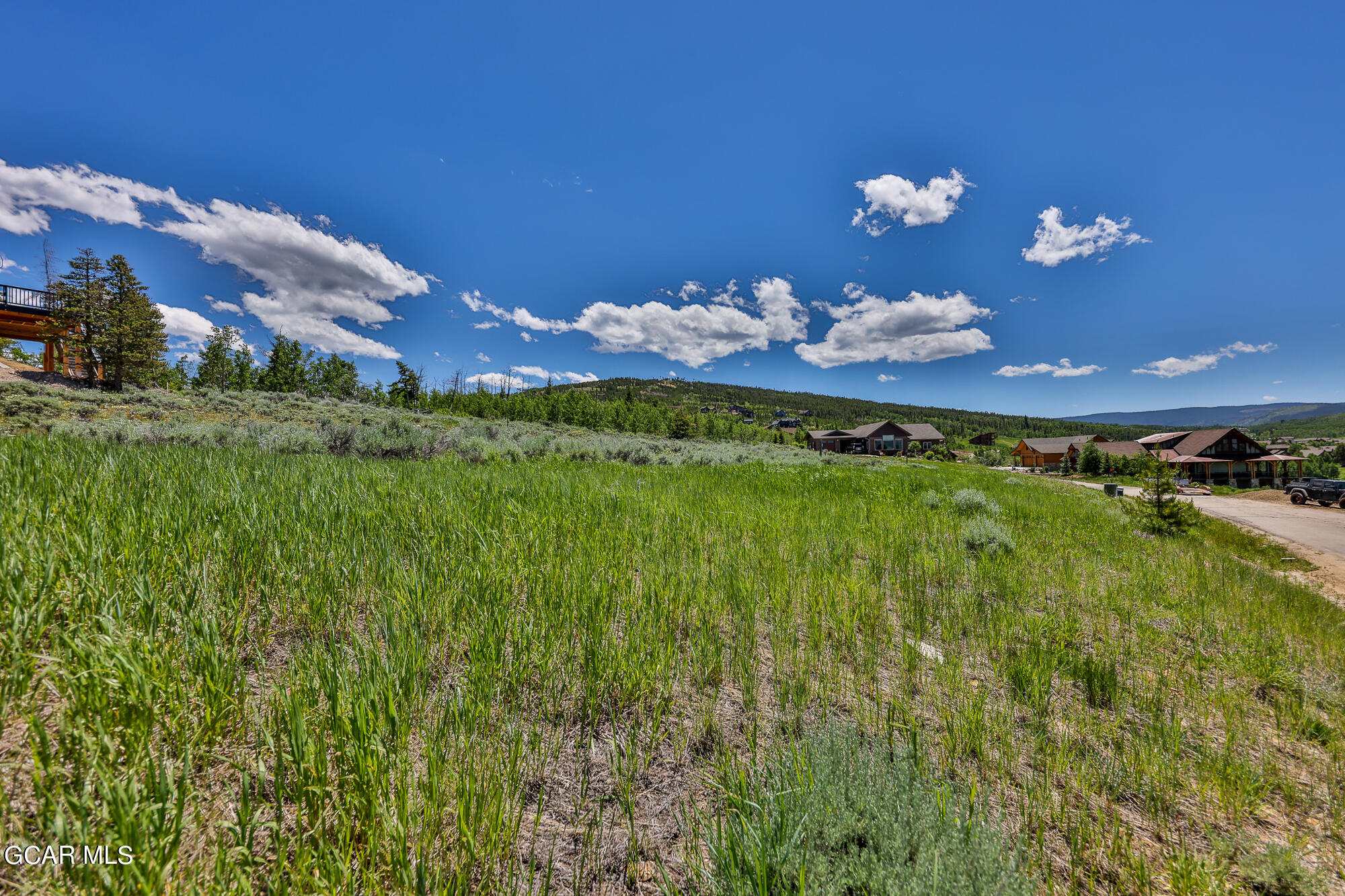 502 Upper Ranch View Drive Granby, CO 80446 - Photo 4 of 40 a view of a house with a big yard