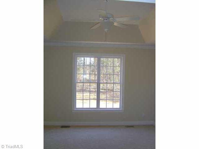 4002 Ballard Farm Road Colfax, NC 27235 - Photo 4 of 8 Other. Spacious main level master bedroom with tray ceiling