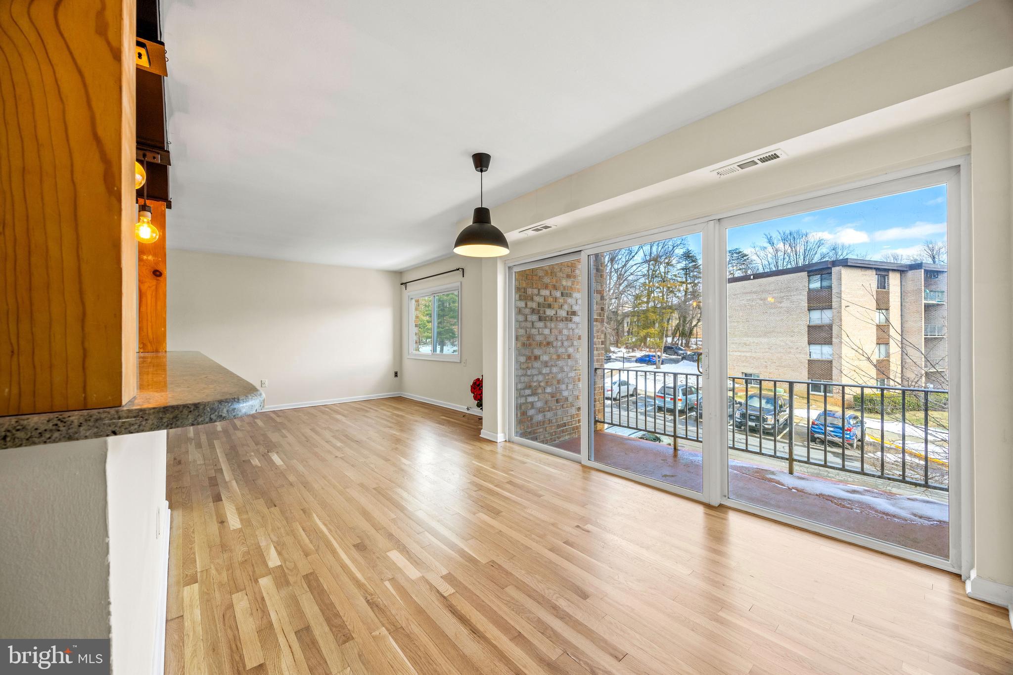 3736 Bel Pre Road, Unit 37367 Silver Spring, MD 20906 - Photo 13 of 27 a view of an entryway with wooden floor