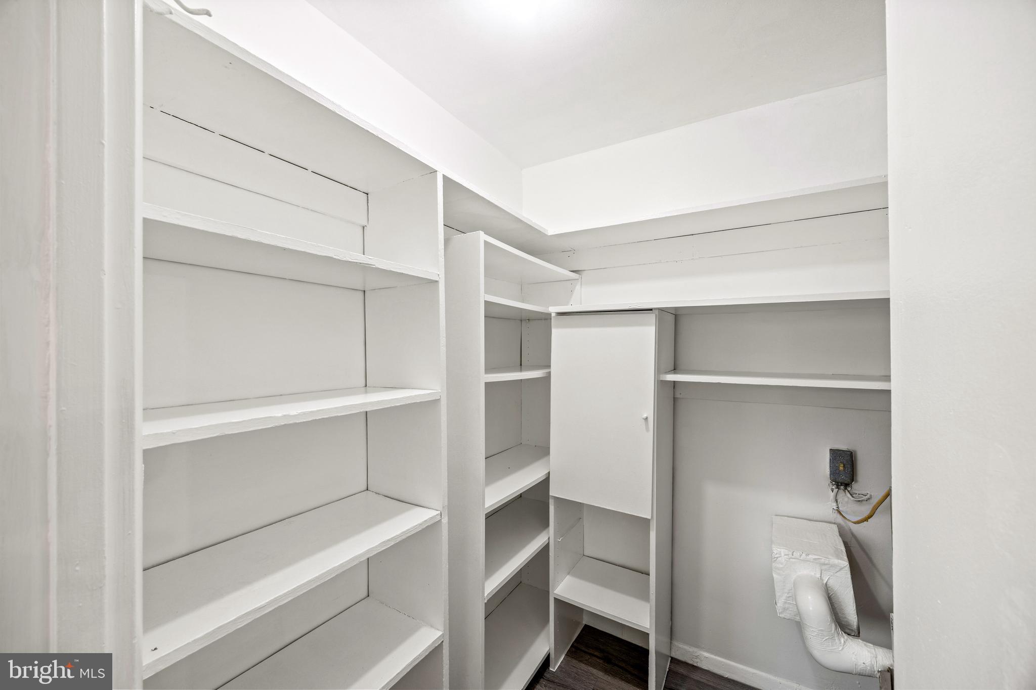3736 Bel Pre Road, Unit 37367 Silver Spring, MD 20906 - Photo 24 of 27 a view of walk in closet with empty racks