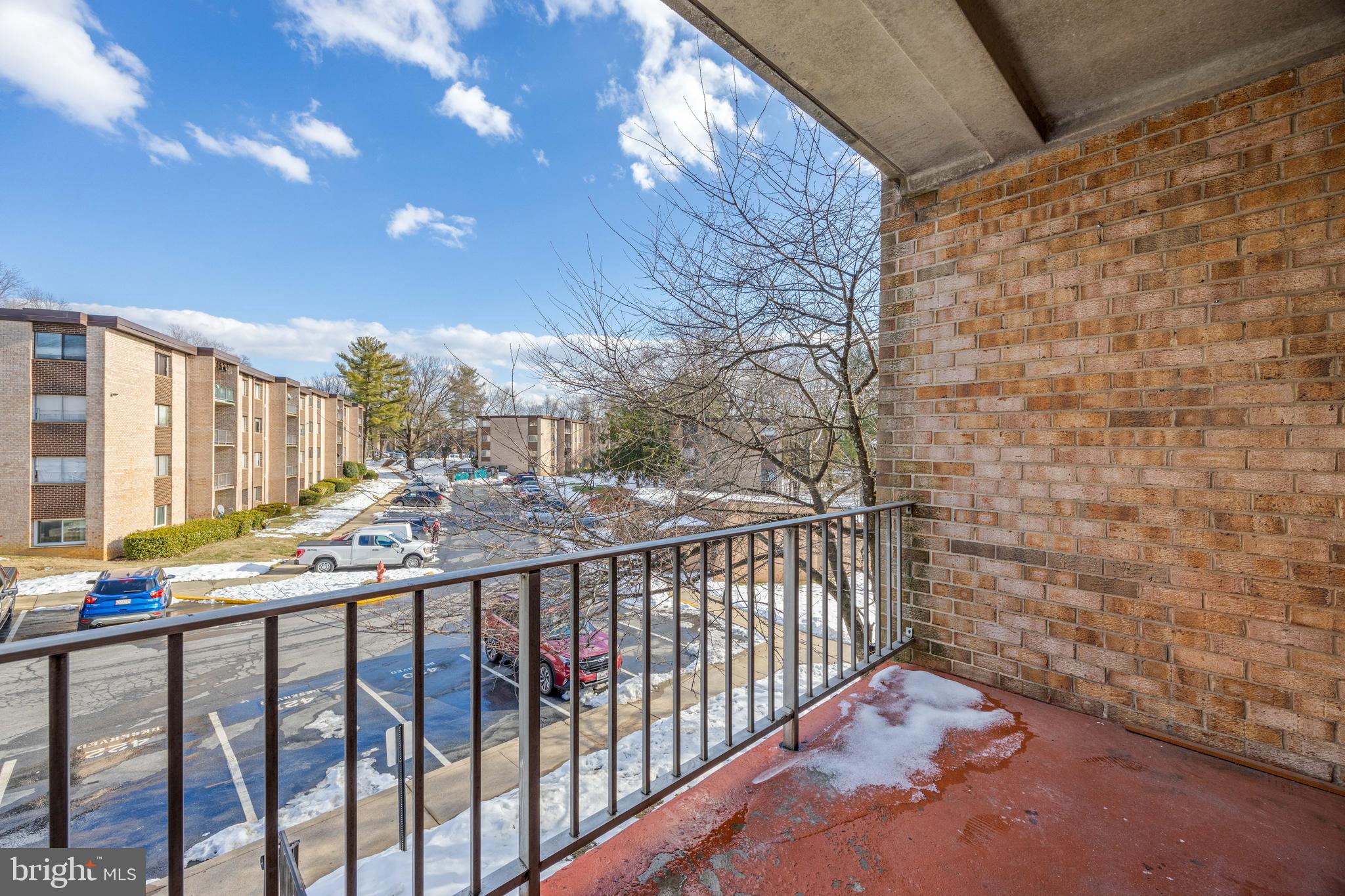 3736 Bel Pre Road, Unit 37367 Silver Spring, MD 20906 - Photo 25 of 27 a view of balcony with wooden floor