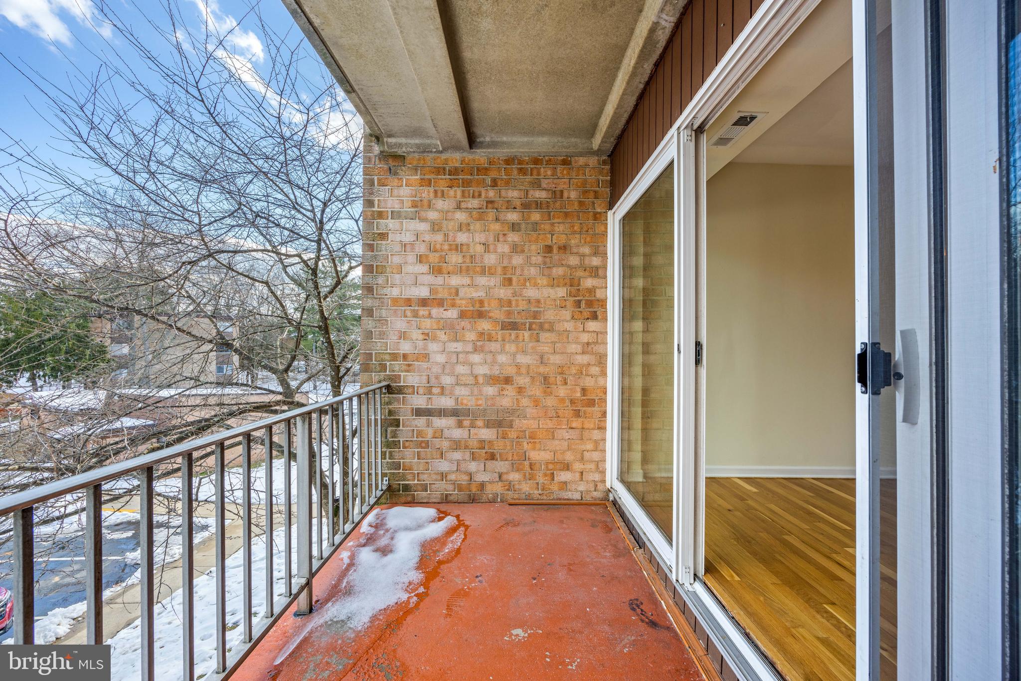 3736 Bel Pre Road, Unit 37367 Silver Spring, MD 20906 - Photo 26 of 27 a view of a balcony