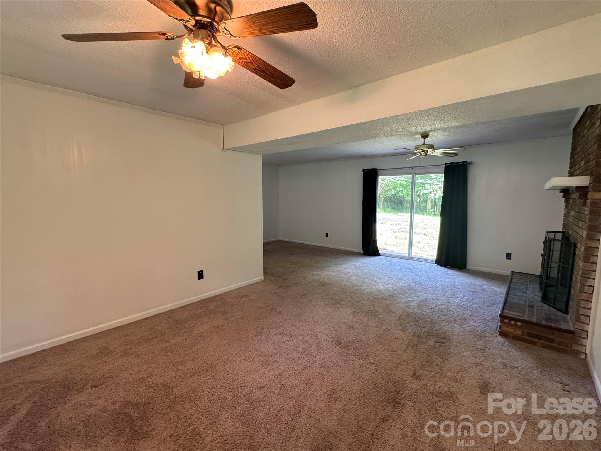 315 Pine Road Mount Holly, NC 28120 - Photo 19 of 21 a view of an empty room with a window