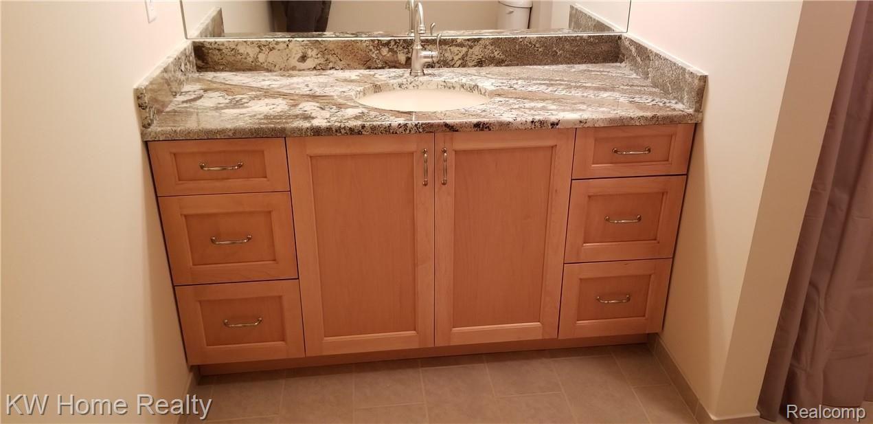 2169 Cove Road Goodells, MI 48027 - Photo 32 of 65 Maple Cabinets W/Granite Countertops