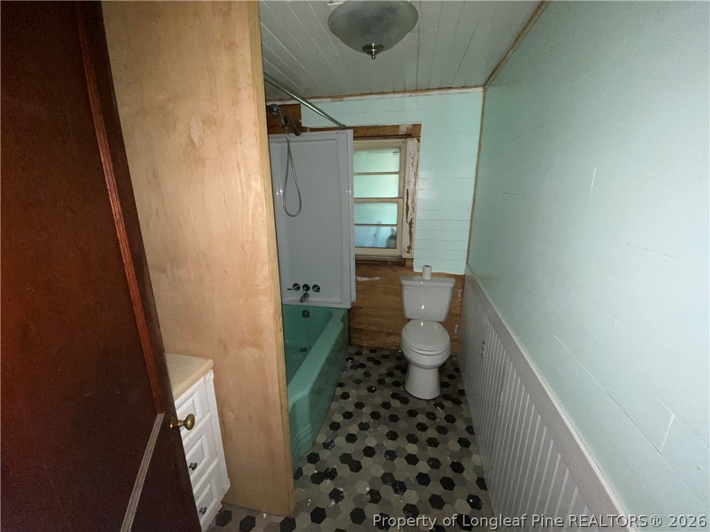 10717 Colliers Chapel Church Road Linden, NC 28356 - Photo 12 of 20 a bathroom with a sink and a toilet