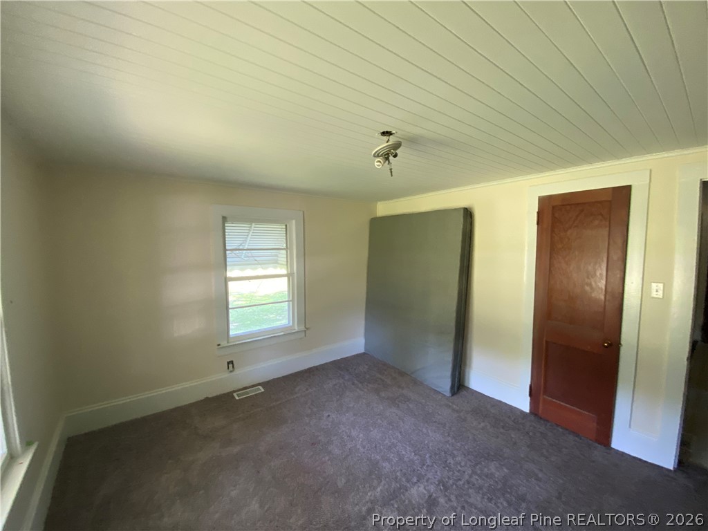 10717 Colliers Chapel Church Road Linden, NC 28356 - Photo 13 of 20 an empty room with windows