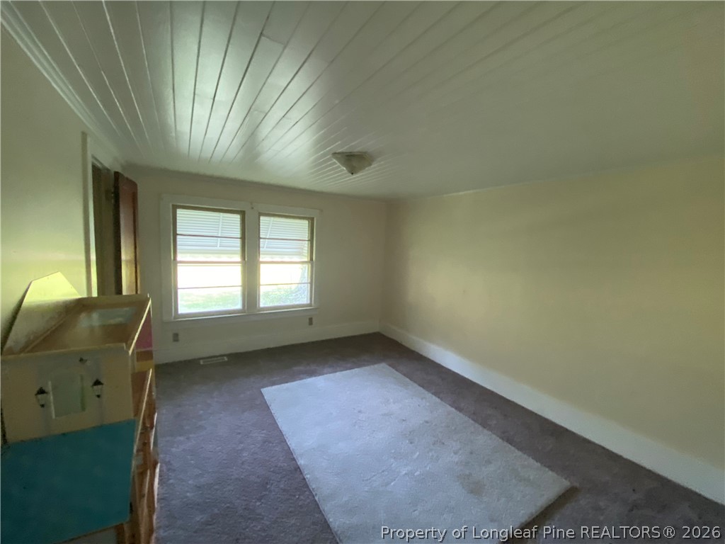 10717 Colliers Chapel Church Road Linden, NC 28356 - Photo 14 of 20 an empty room with a window
