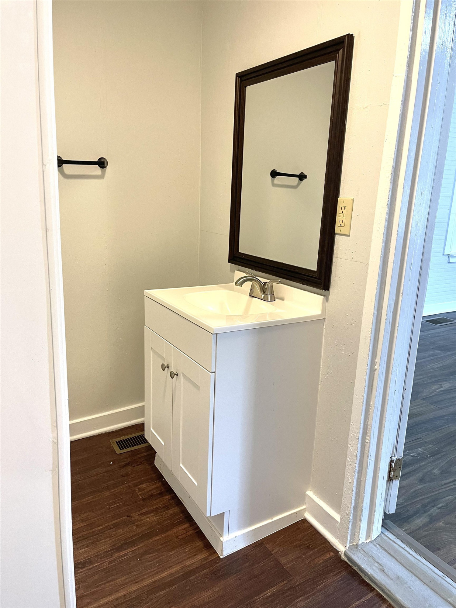 1 Butler Street Jackson, TN 38301 - Photo 11 of 13 a view of a bathroom with wooden floor