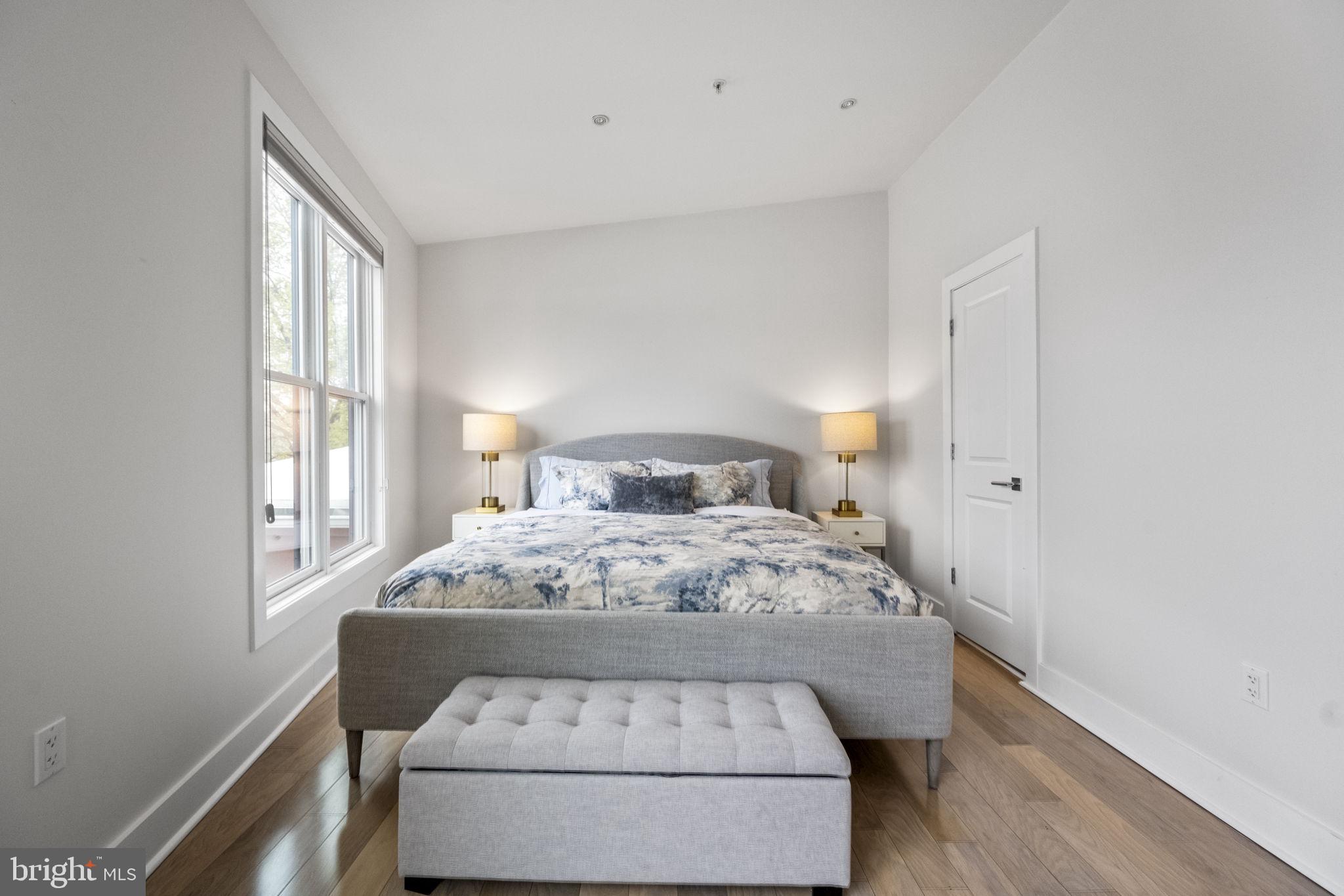 501 Rhode Island Avenue Northwest, Unit 2 Washington, DC 20001 - Photo 14 of 21 a room with a bed and a window