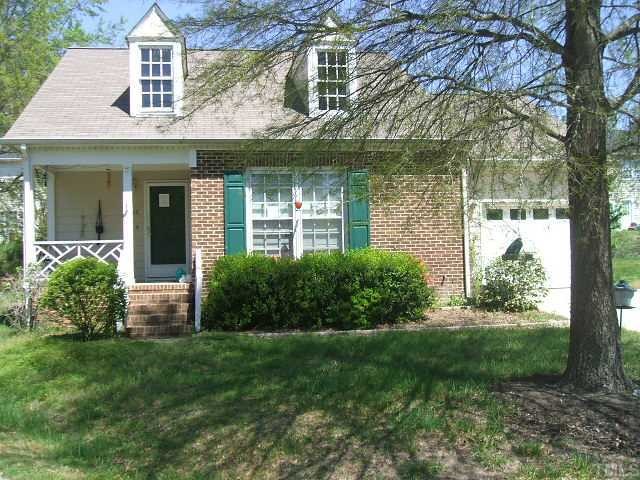 2812 Fernhurst Court Raleigh, NC 27604 - Photo 1 of 4 a front view of a house with a yard