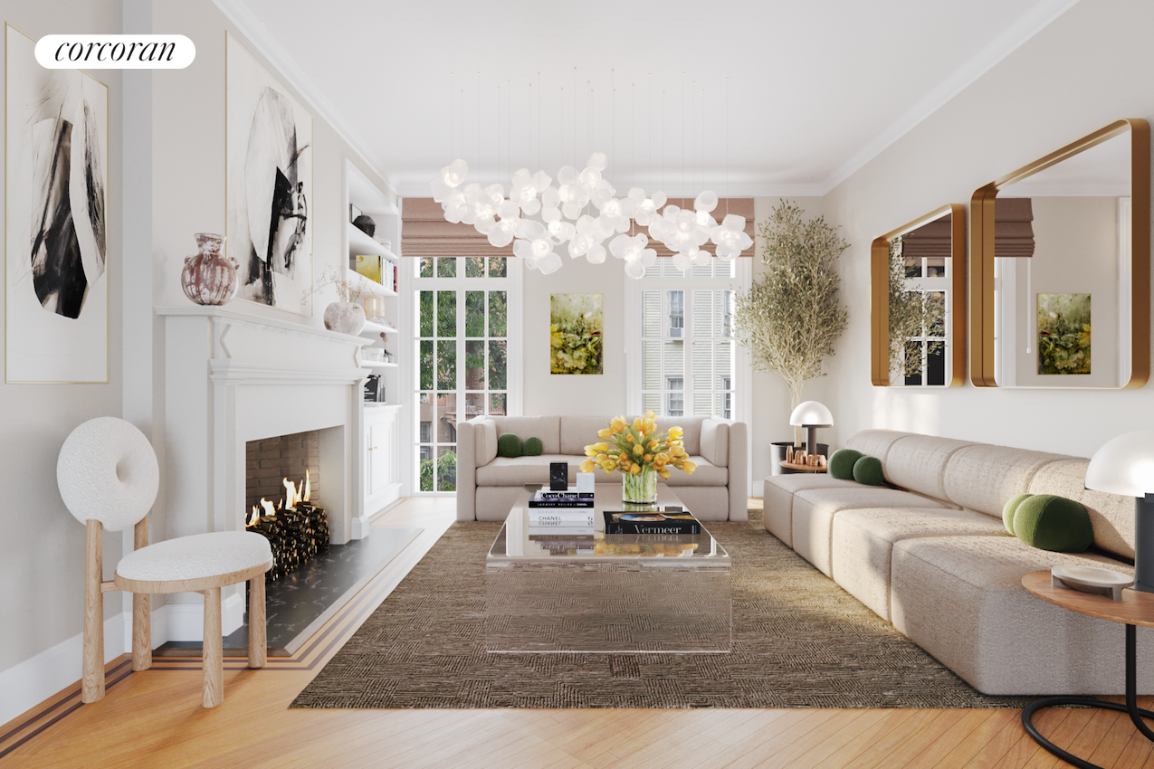138 Henry Street Brooklyn, NY 11201 - Photo 1 of 1 a living room with furniture a fireplace and a chandelier