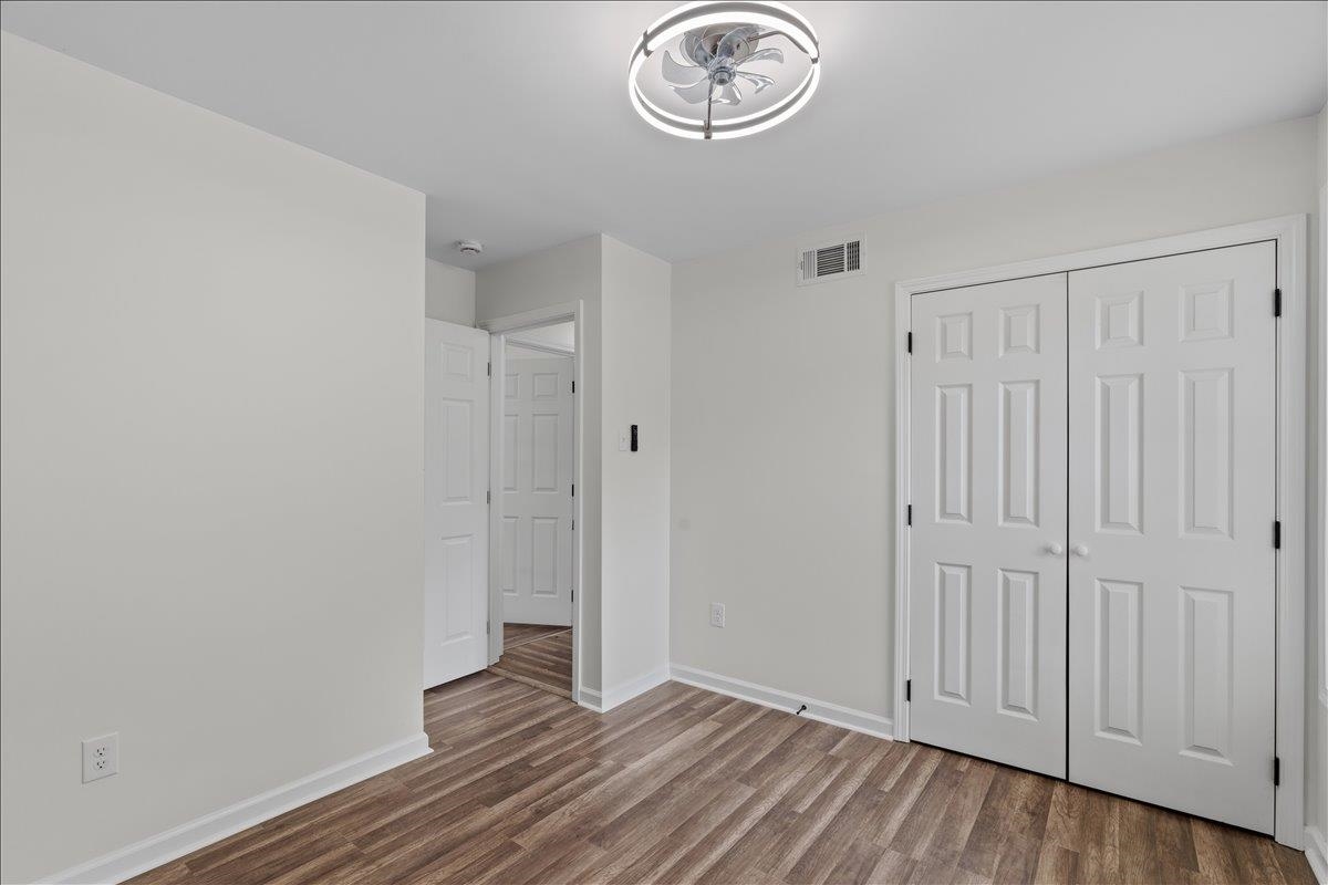 3065 Sax Road Memphis, TN 38109 - Photo 5 of 17 Bright interior room featuring wood-finish flooring and a contemporary ceiling fan with integrated lighting