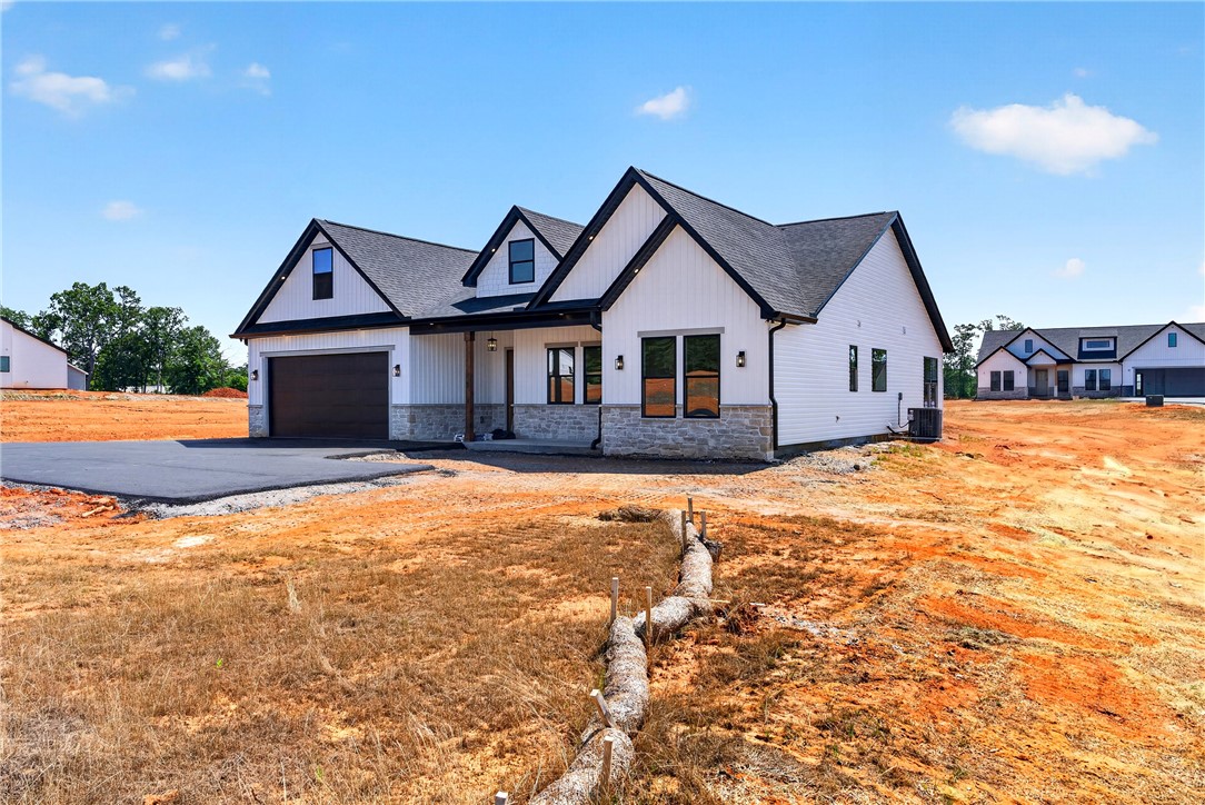 416 Blume Road Anderson, SC 29625 - Photo 2 of 29 A newly constructed modern farmhouse with crisp white siding and dark trim awaits your personal touches.