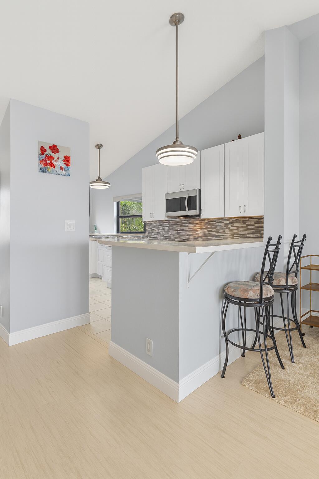 10920 Lakemore Lane, Unit 201 Boca Raton, FL 33498 - Photo 15 of 37 KITCHEN BAR