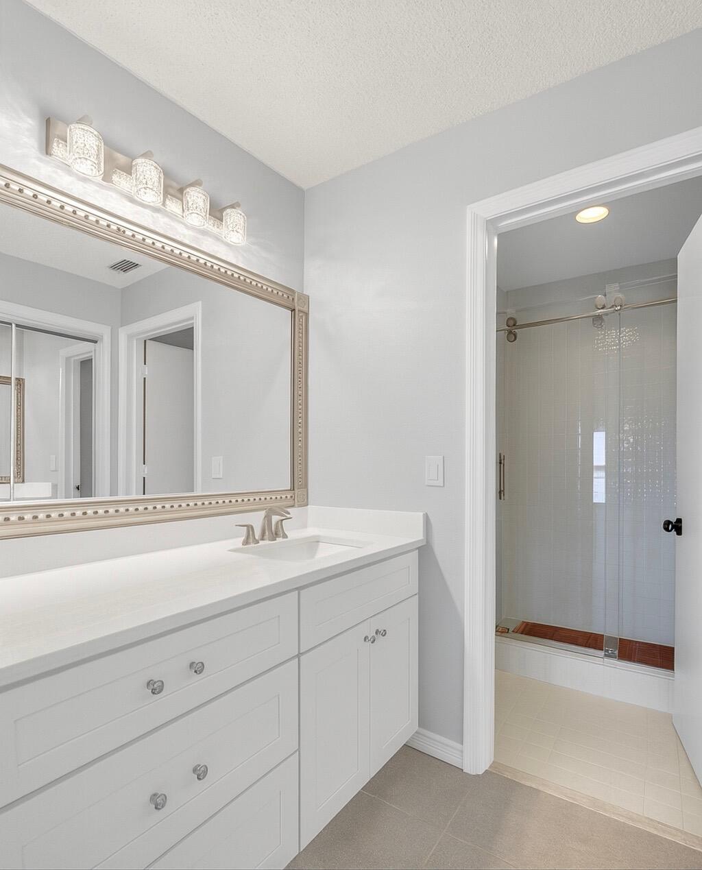 10920 Lakemore Lane, Unit 201 Boca Raton, FL 33498 - Photo 24 of 37 PRIMARY SHOWER