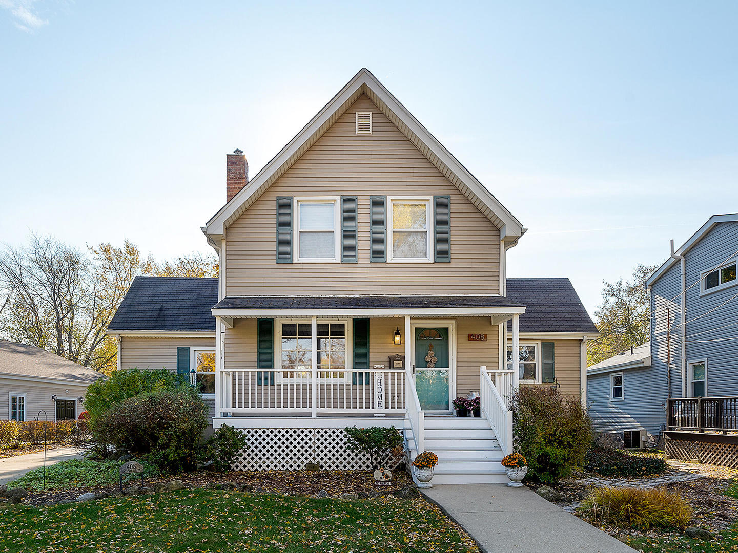 408 Crescent Street Wheaton, IL 60187 - Photo 1 of 36 a front view of a house with a yard