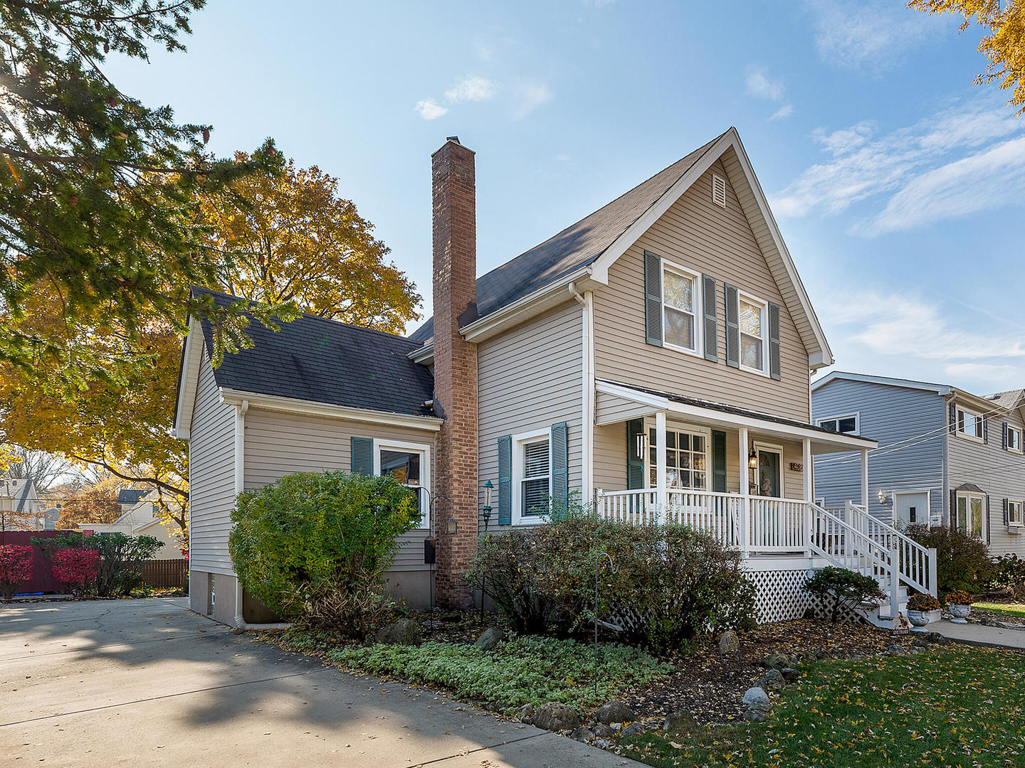 408 Crescent Street Wheaton, IL 60187 - Photo 2 of 36 a front view of a house with garden