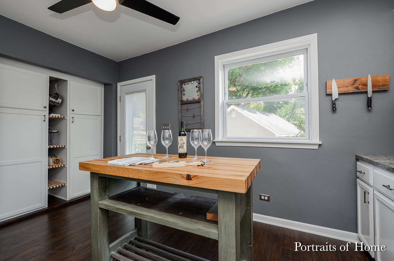 408 Crescent Street Wheaton, IL 60187 - Photo 12 of 36 a dining room with a table and chairs