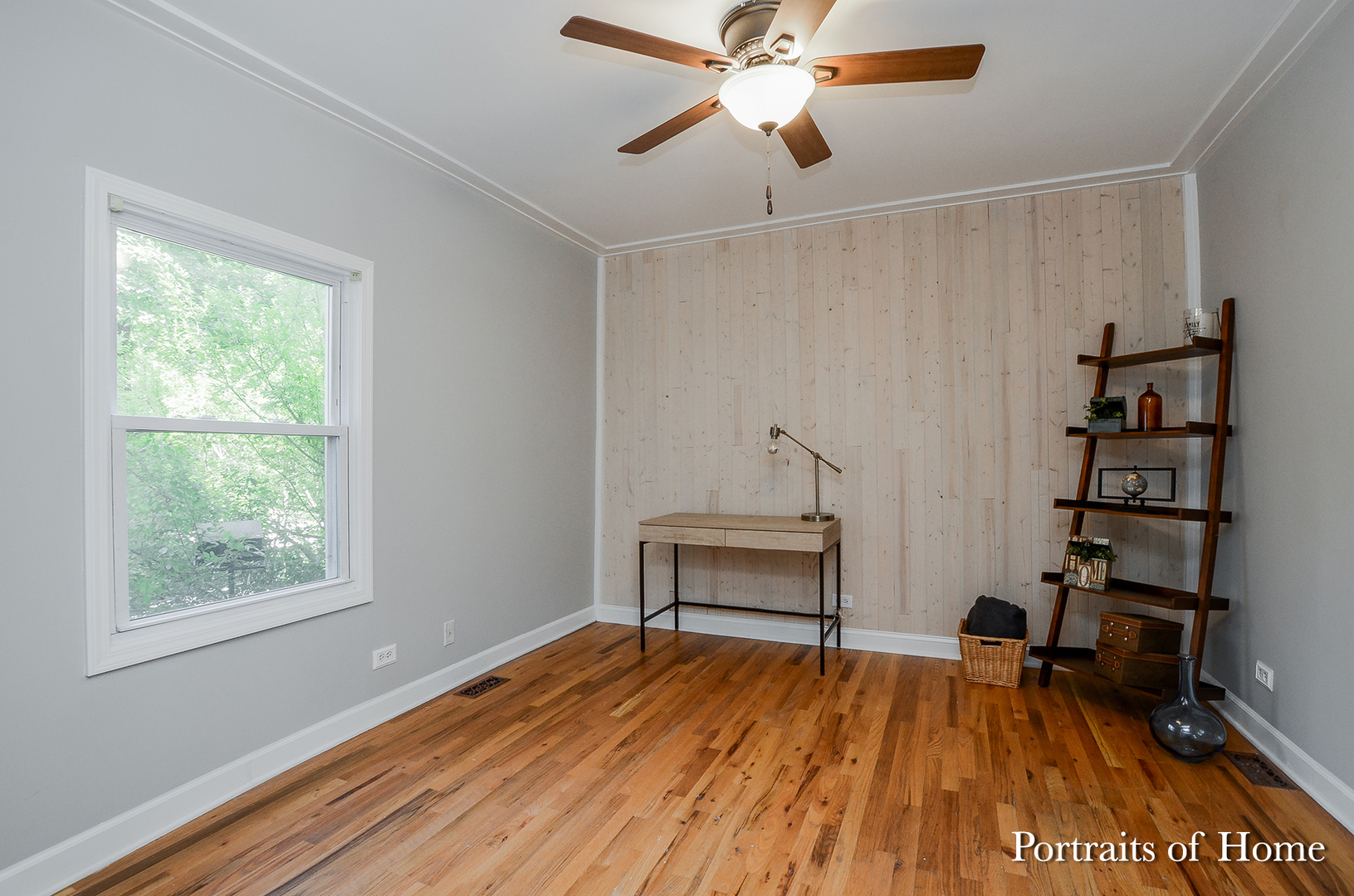 408 Crescent Street Wheaton, IL 60187 - Photo 14 of 36 a view of a workspace with furniture and wooden floor