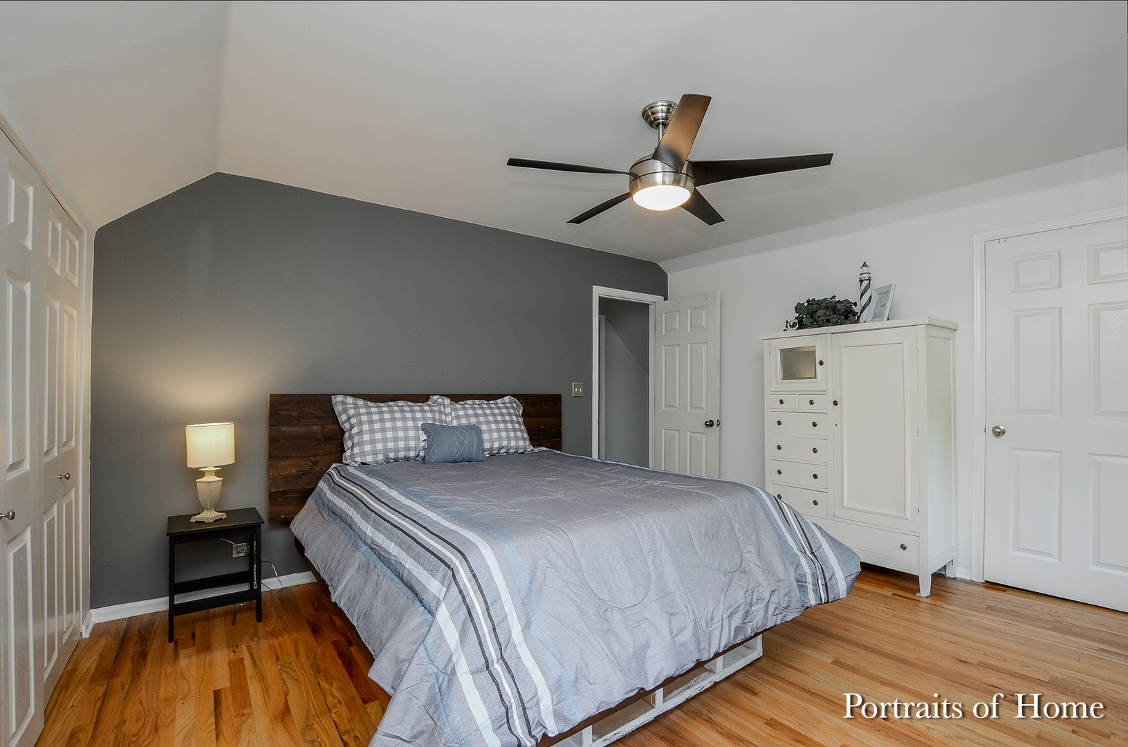 408 Crescent Street Wheaton, IL 60187 - Photo 16 of 36 a bedroom with a bed and a ceiling fan