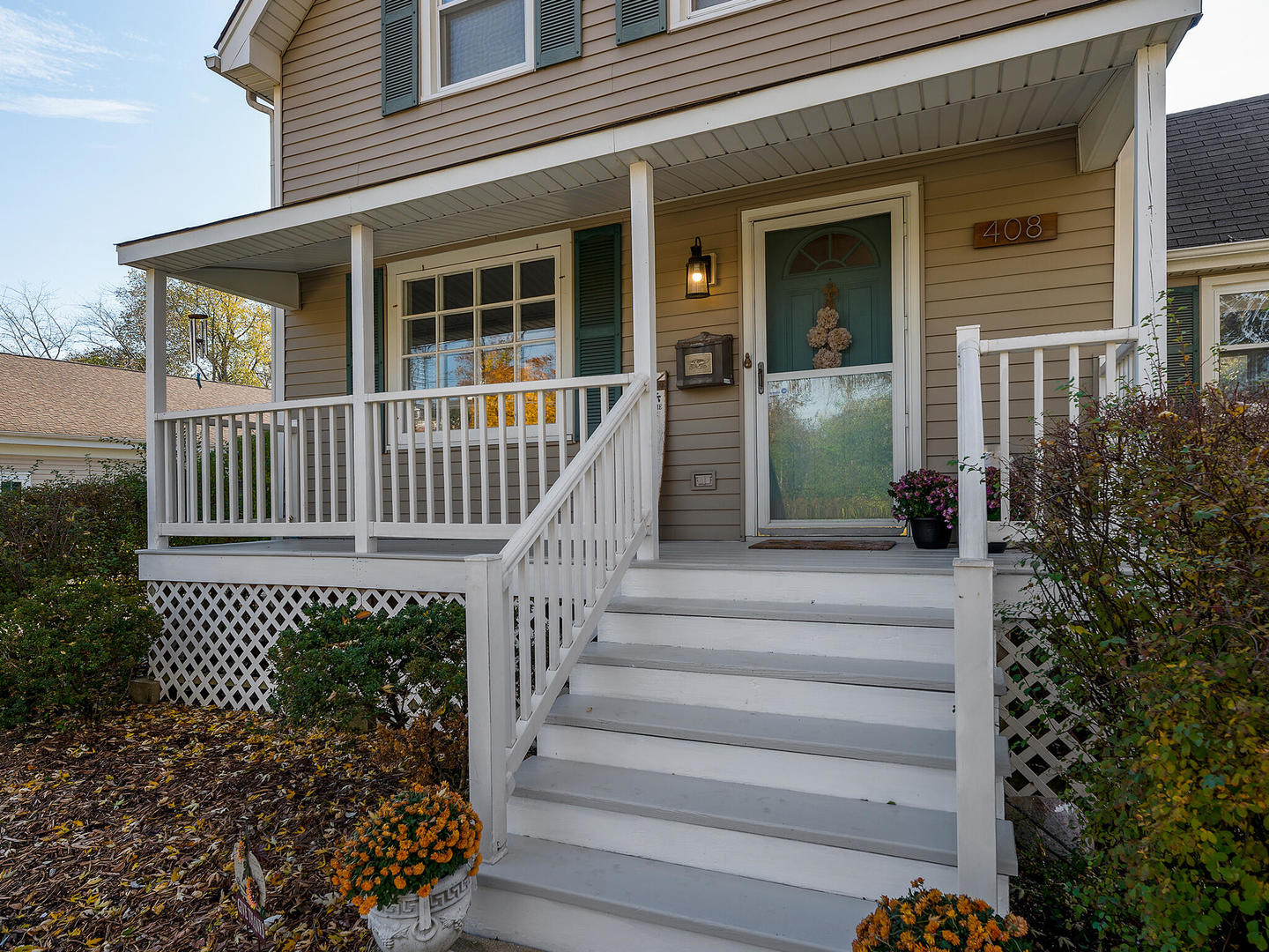 408 Crescent Street Wheaton, IL 60187 - Photo 3 of 36 a view of a house with a small yard and wooden floor and fence