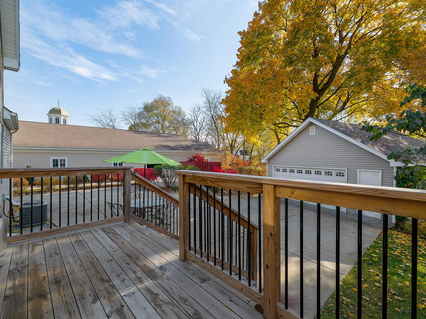 408 Crescent Street Wheaton, IL 60187 - Photo 21 of 36 a view of a wooden deck and a yard