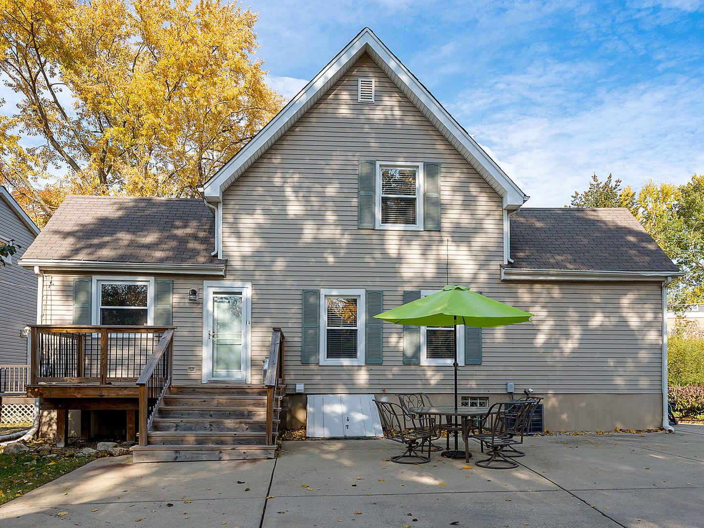 408 Crescent Street Wheaton, IL 60187 - Photo 22 of 36 a front view of a house with table and chairs