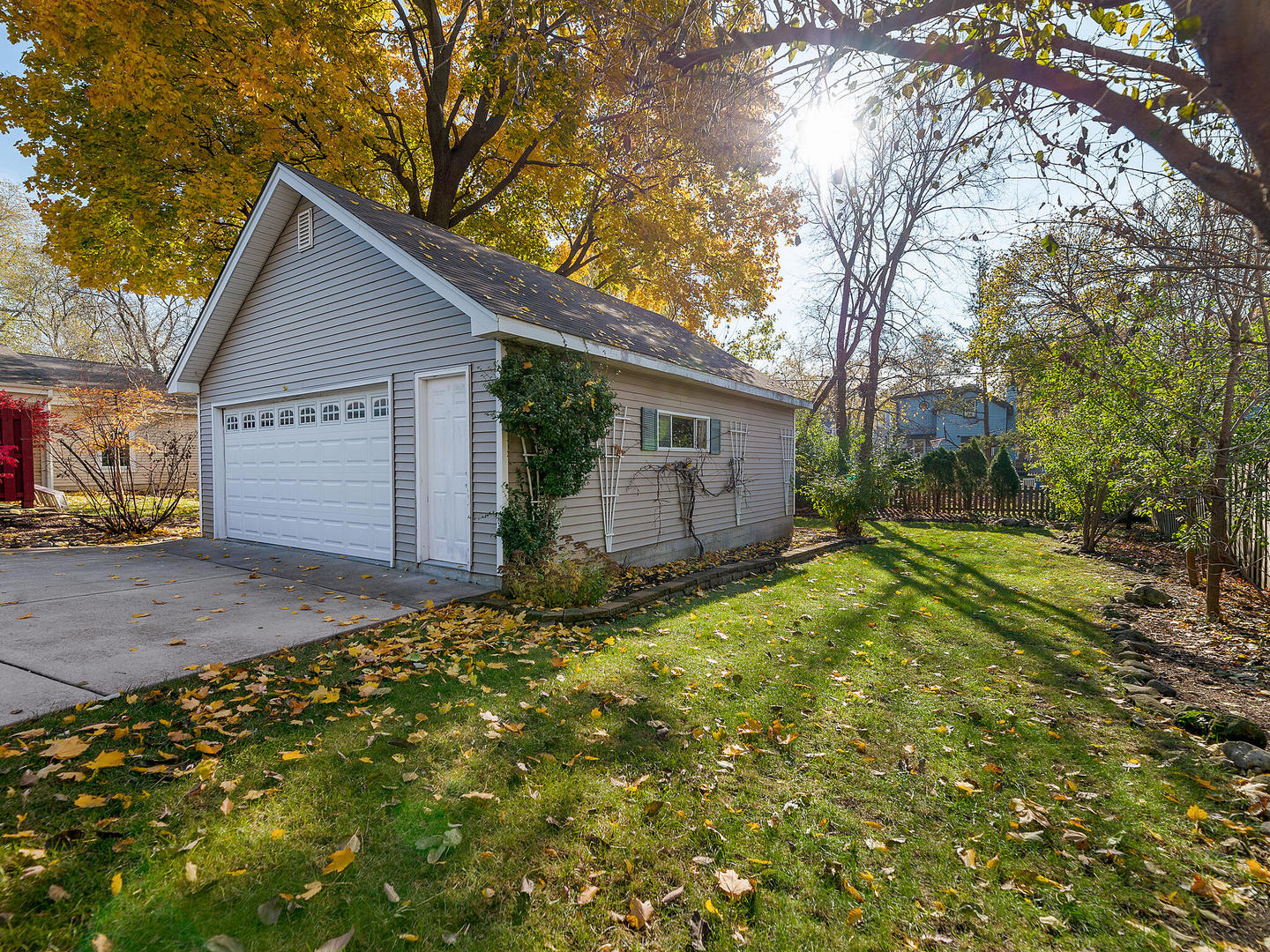 408 Crescent Street Wheaton, IL 60187 - Photo 25 of 36 a view of a house with a yard and garage