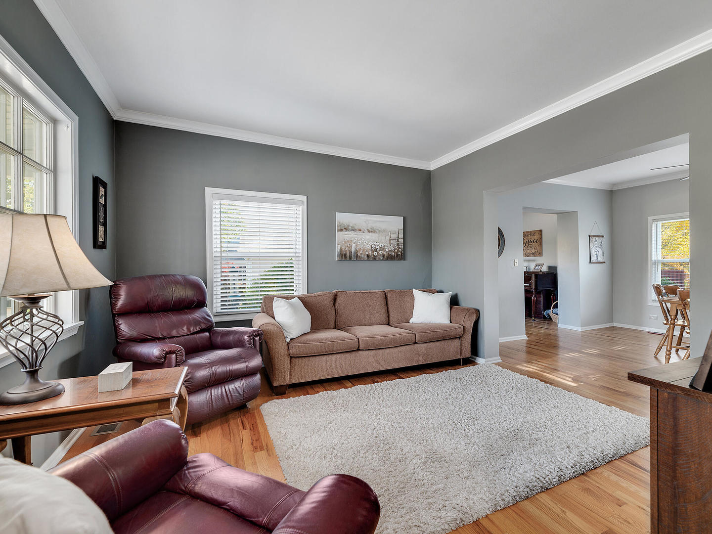408 Crescent Street Wheaton, IL 60187 - Photo 6 of 36 a living room with furniture wooden floor and a window
