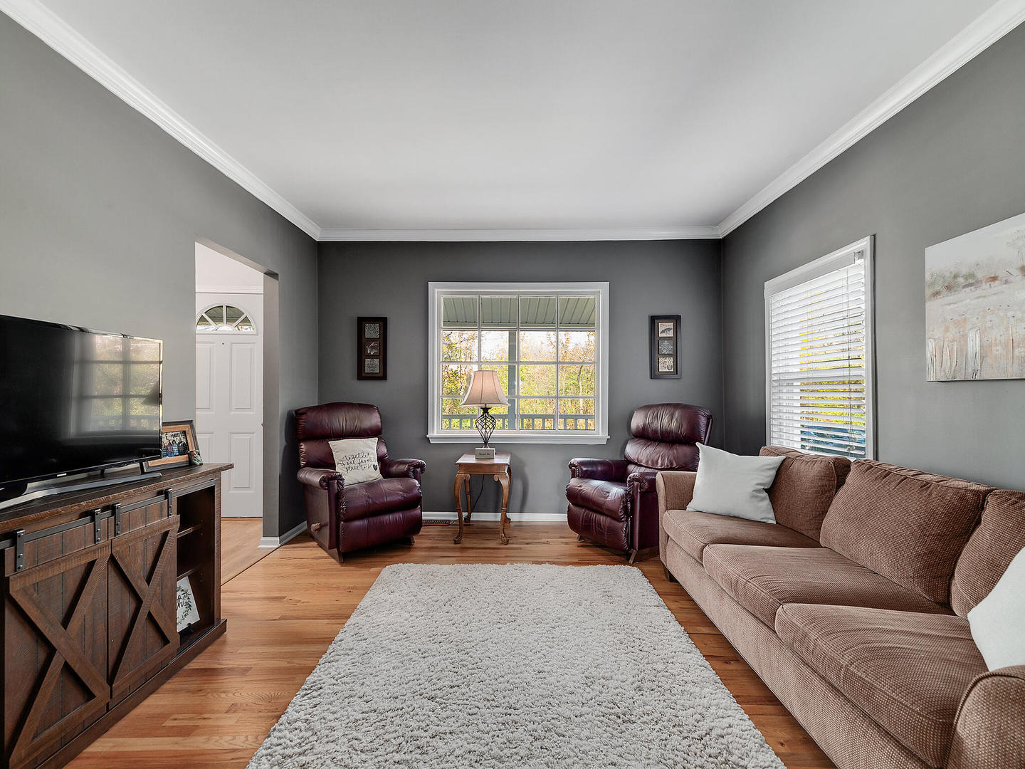 408 Crescent Street Wheaton, IL 60187 - Photo 7 of 36 a living room with furniture and a flat screen tv