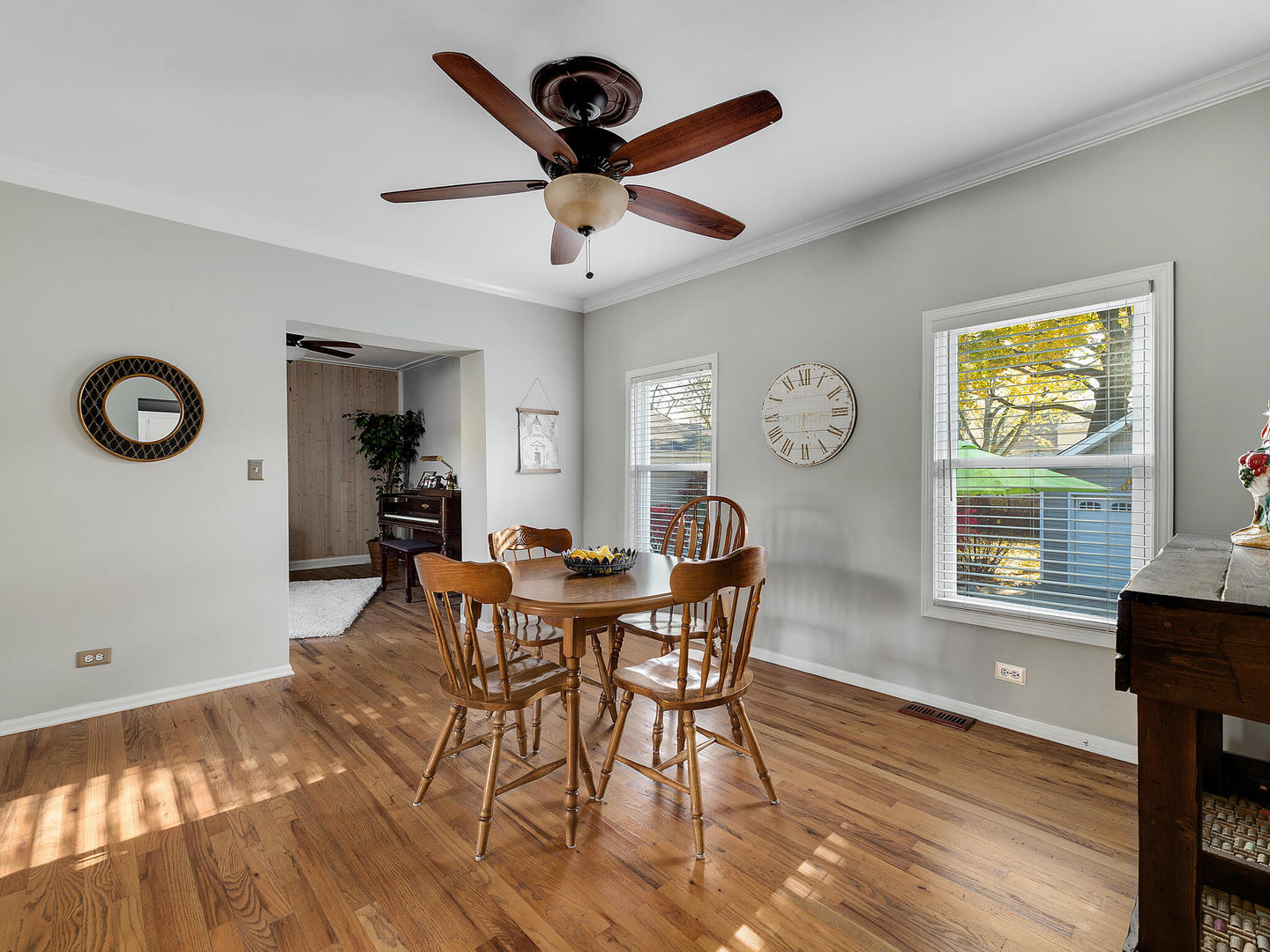 408 Crescent Street Wheaton, IL 60187 - Photo 10 of 36 a view of a dining room with furniture window and wooden floor