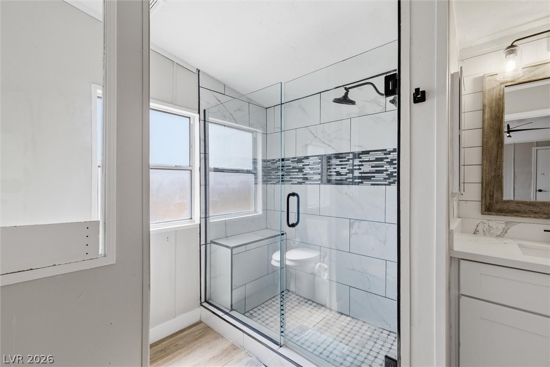 4331 Retread Road Pahrump, NV 89048 - Photo 16 of 31 A well-appointed bath boasts a spacious glass-enclosed shower, perfect for a refreshing start or end to the day.