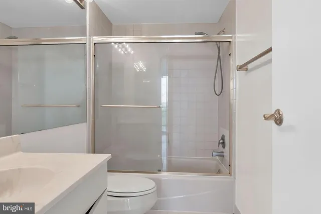 a bathroom with a shower a bathtub and a shower