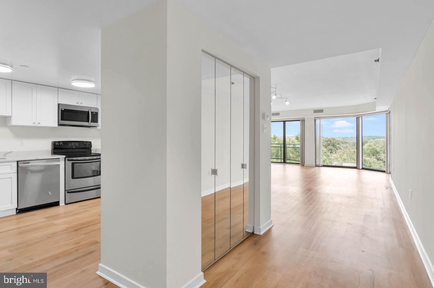 1530 Key Boulevard, Unit 715 Arlington, VA 22209 - Photo 4 of 41 a view of a kitchen with a stove top oven