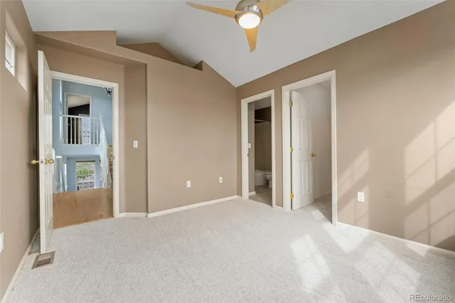 a view of a livingroom with a ceiling fan